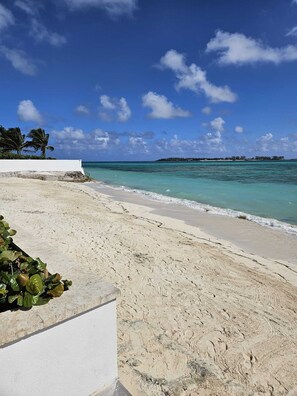 On the beach, sun loungers, beach towels
