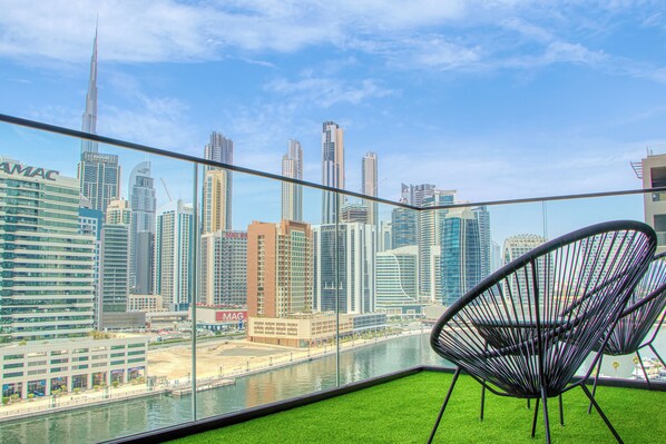 Deluxe Studio, Balcony, Canal View | Terrace/patio - Dubai Skyline Retreat (Dubai)