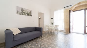 Apartment | Living area | 35-inch TV with digital channels