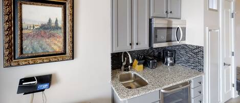 Fridge, microwave, coffee/tea maker, toaster