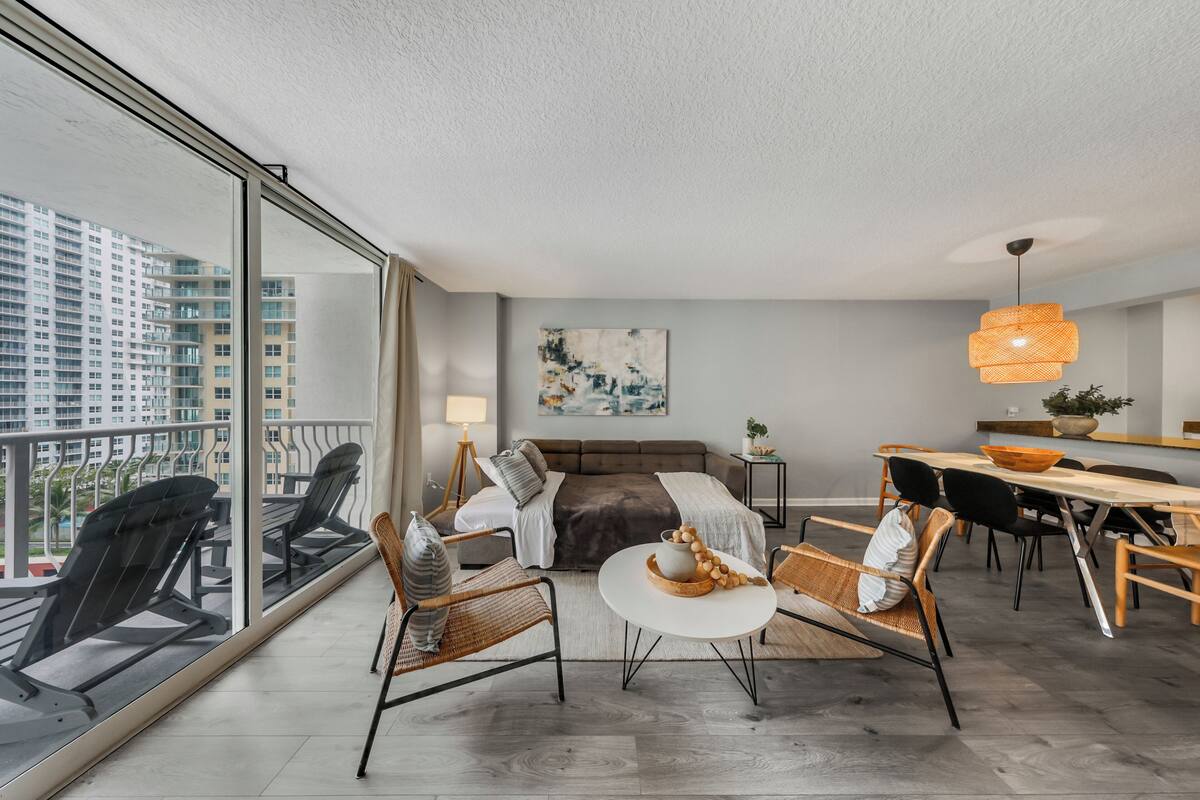 Condo, 1 Bedroom, Partial Ocean View | Living area | 50-inch Smart TV with cable channels, table football