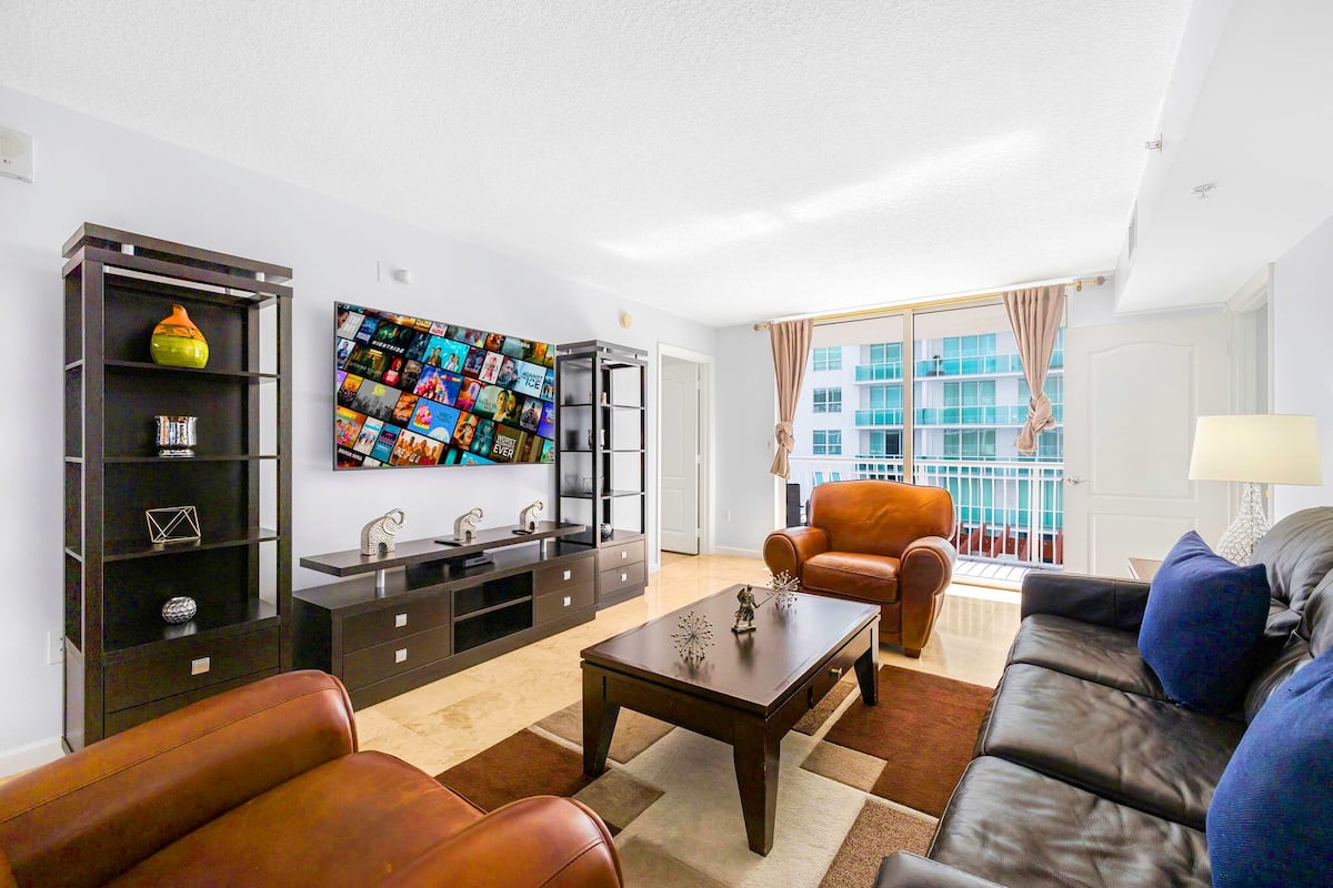 Luxury Condo, 2 Bedrooms, City View | Living area | 50-inch Smart TV with cable channels, foosball