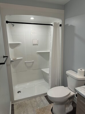 Shower, towels, soap, shampoo