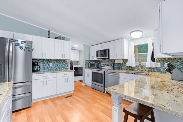 Maison, plusieurs lits, cuisine, vue jardin (Sportsman's Den) | Cuisine privée | Cafetière/bouilloire