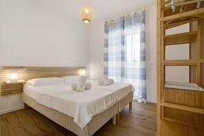 2 slaapkamers, een strijkplank/strijkijzer, gratis wifi, beddengoed