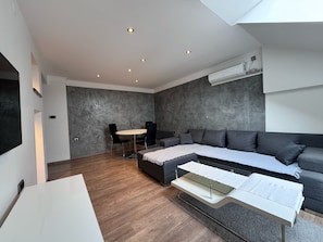 Apartemen Comfort, 1 kamar tidur | Area keluarga | TV layar datar
