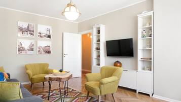Comfort Apartment, 1 Bedroom | Living area | 43-inch flat-screen TV with cable channels, TV