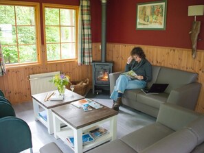 Living area - Cozy Chalet With a Decorative Fireplace (Ruinen)