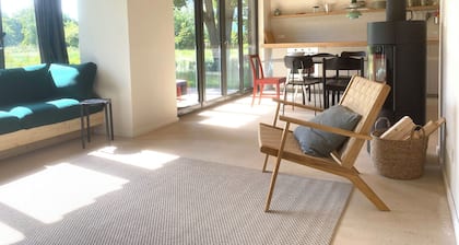 Bright vacation home on Lake Zenssee with fireplace and terrace