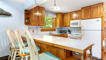 House, Multiple Beds, Patio (Swan Song) | Private kitchen | Coffee/tea maker
