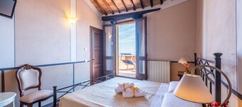 Kamer 'Camera Beige' - Beb del Musico met privéterras, balkon en draadloos internet