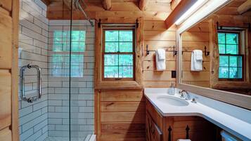 Cabin, 2 Double Beds, Patio, Mountain View (The Guest House) | Bathroom | Shower, hair dryer, towels