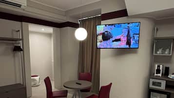 Superior Room, 1 Double Bed with Sofa bed, Non Smoking | Living area | 42-inch TV with digital channels