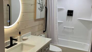 Hair dryer, towels, soap, shampoo