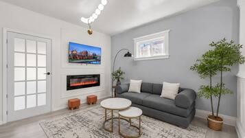 Smart TV, fireplace, foosball, books