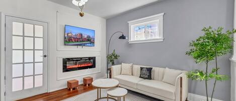 Smart TV, fireplace, table football, books