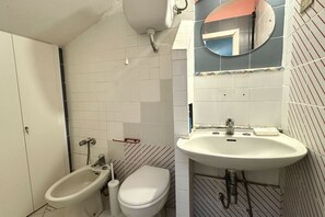 Ducha, bidé y toallas