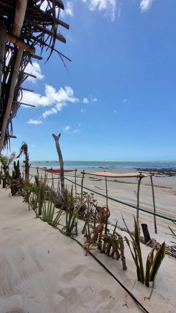 On the beach, sun loungers, beach umbrellas, beach towels