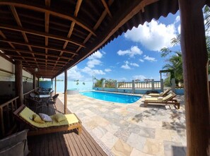 Outdoor pool, open 8:00 AM to 8:30 PM, pool umbrellas, sun loungers