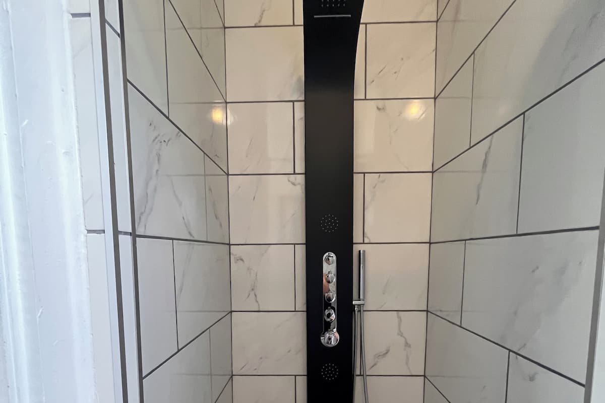 Shower, free toiletries, hair dryer, towels