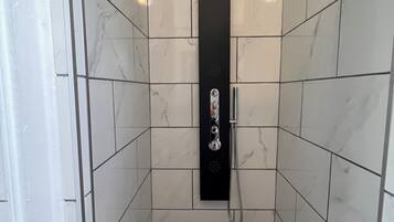 Shower, free toiletries, hair dryer, towels