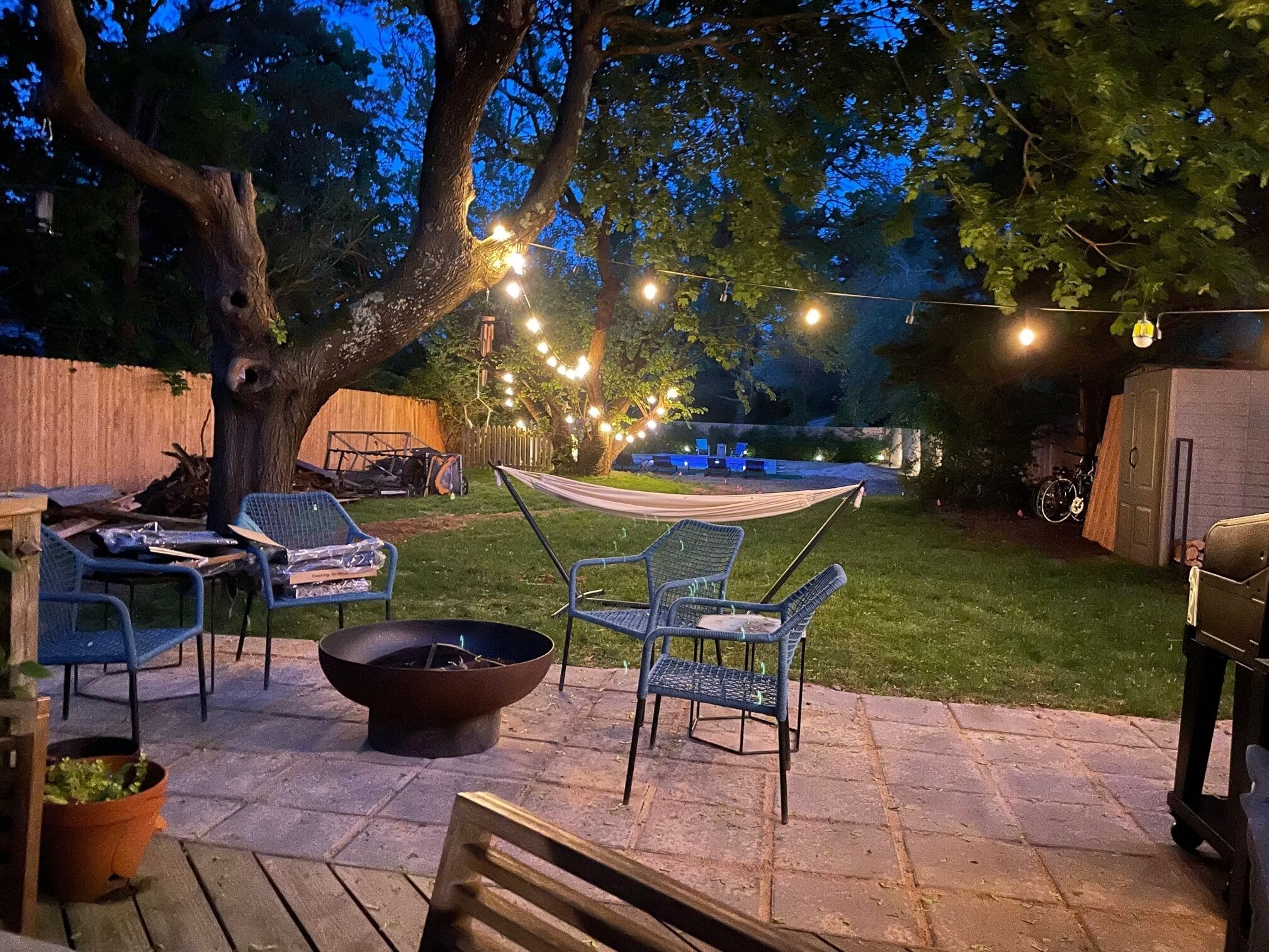 Beach house in Hampton Bays with inground swimming pool and outdoor fire pit.