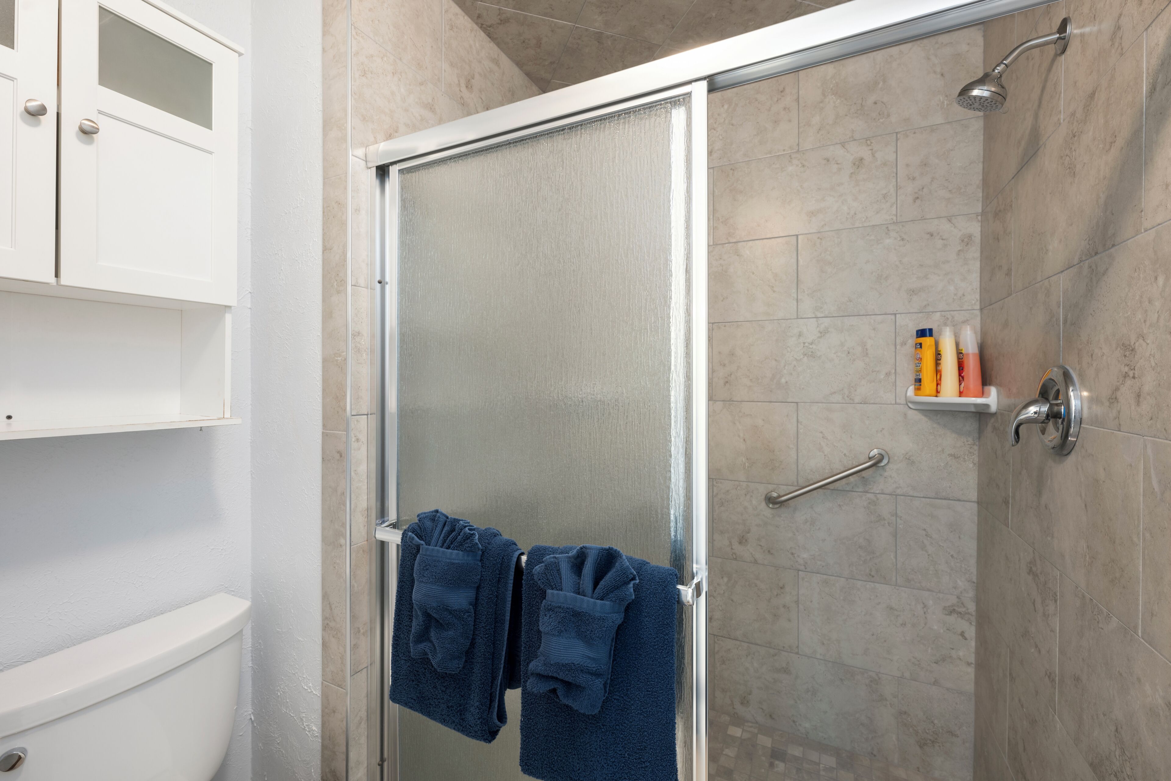 Hair dryer, towels, soap, shampoo