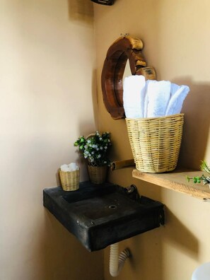 Shower, towels, soap, toilet paper