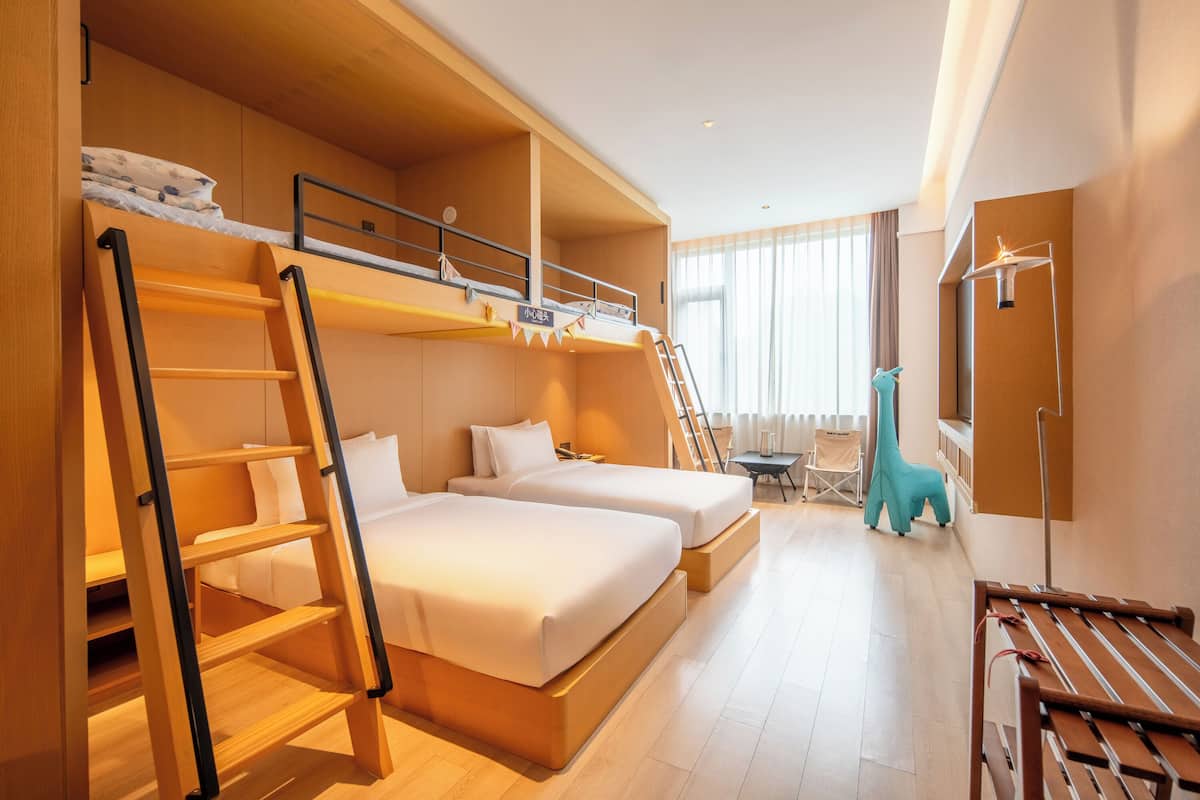Family Quad Room | Down duvets, free minibar items, individually decorated, soundproofing