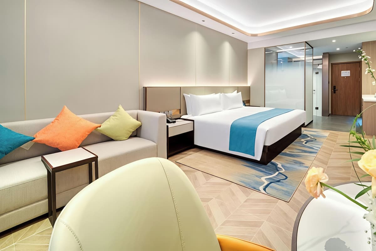 Deluxe Room, City View | Minibar, desk, laptop workspace, soundproofing