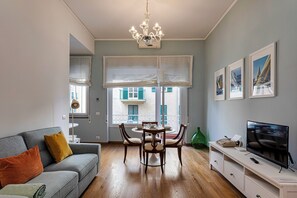 Apartment, Balcony | Living area | 35-inch TV with digital channels - Light Apartment in Albaro (Genoa)