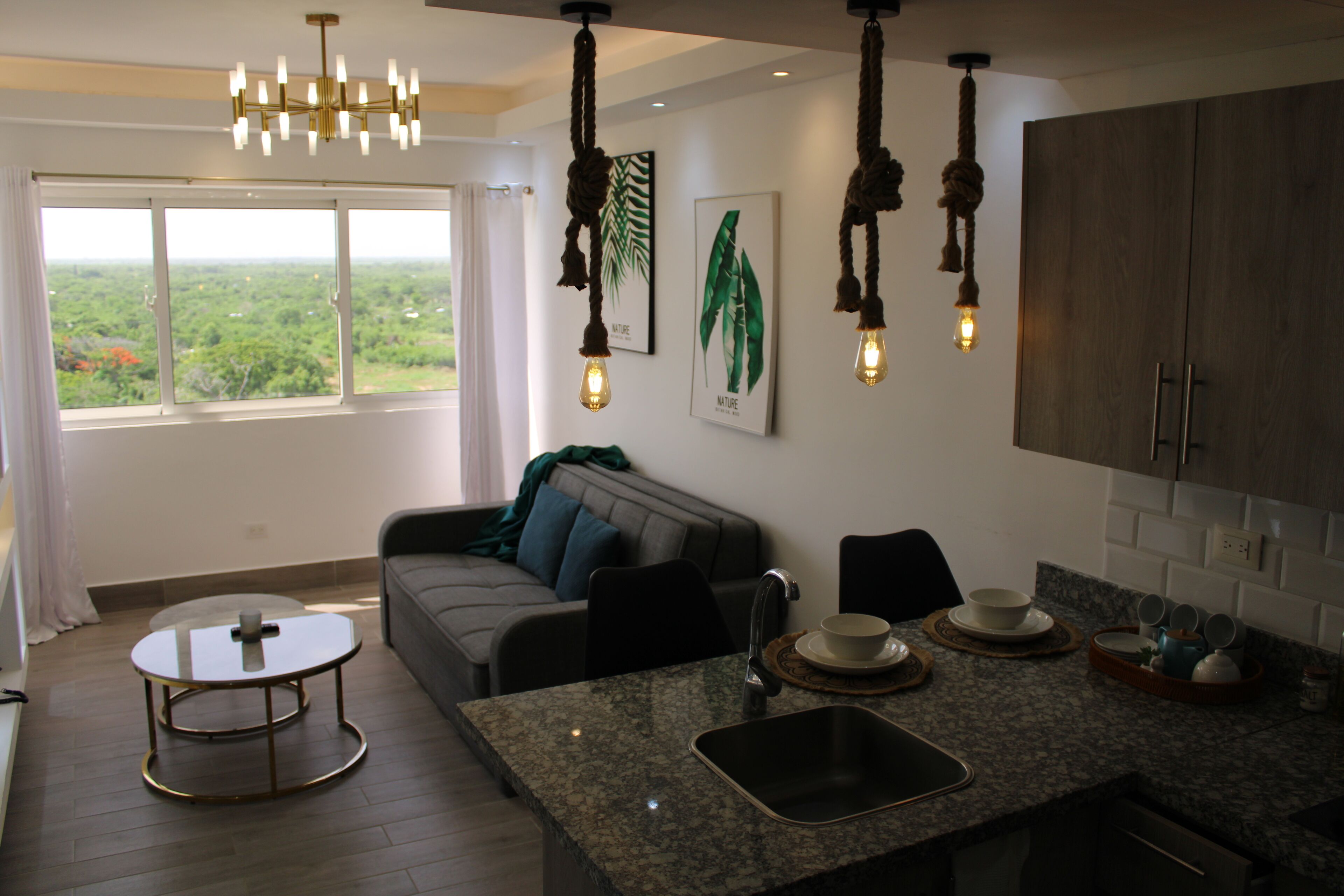 Deluxe Apartment | Living area | Flat-screen TV