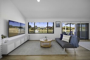 Living area - Deja Bleu - family home with private jetty (Port Macquarie)