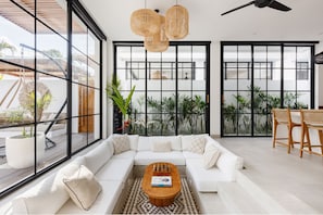 Family Villa, Patio, Pool View | Living area | Flat-screen TV
