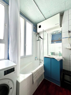 Hair dryer, towels, soap, shampoo