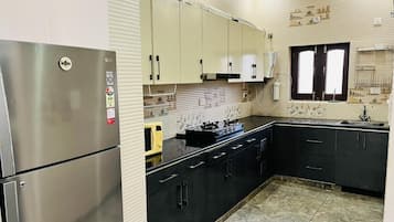 Exclusive Villa | Private kitchen | Fridge, microwave, stovetop, mixer