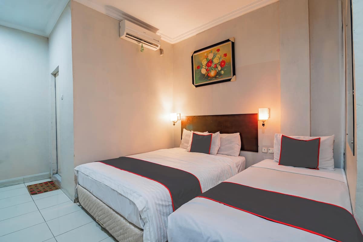 Suite Keluarga | 1 kamar tidur, meja kerja, ruang kerja ramah laptop, dan Wi-Fi gratis