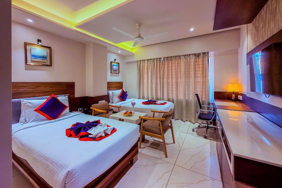 Superior tvåbäddsrum | Sängtillbehör av högsta kvalitet, skrivbord och extrasängar