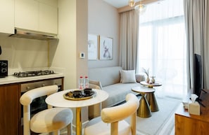 Deluxe Apartment, 1 Bedroom, Balcony, Lake View | Private kitchen | Fridge, oven, stovetop, coffee/tea maker