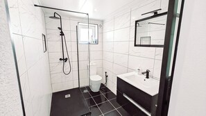 Shower, bidet, towels, soap