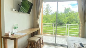 Deluxe Triple Room, Mountain View | Blackout curtains, free WiFi, bed sheets