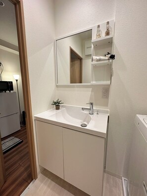 อีโคโนมีอพาร์ทเมนท์ | ห้องน้ำ | ไดร์เป่าผม, รองเท้าสวมภายในห้อง, ผ้าเช็ดตัว