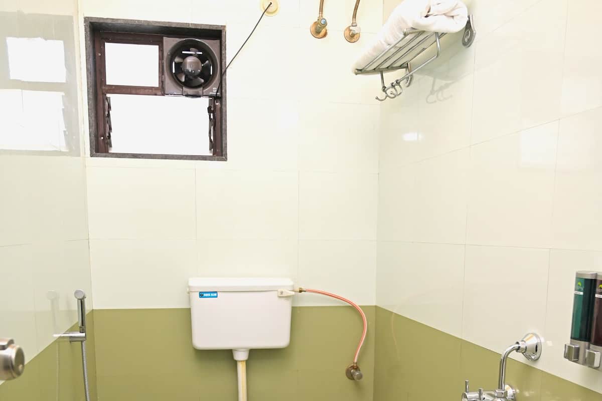 Habitación superior con 2 camas individuales | Baño | Jabón y shampoo