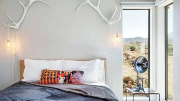 3 habitaciones, tabla de planchar con plancha y cuna de viaje