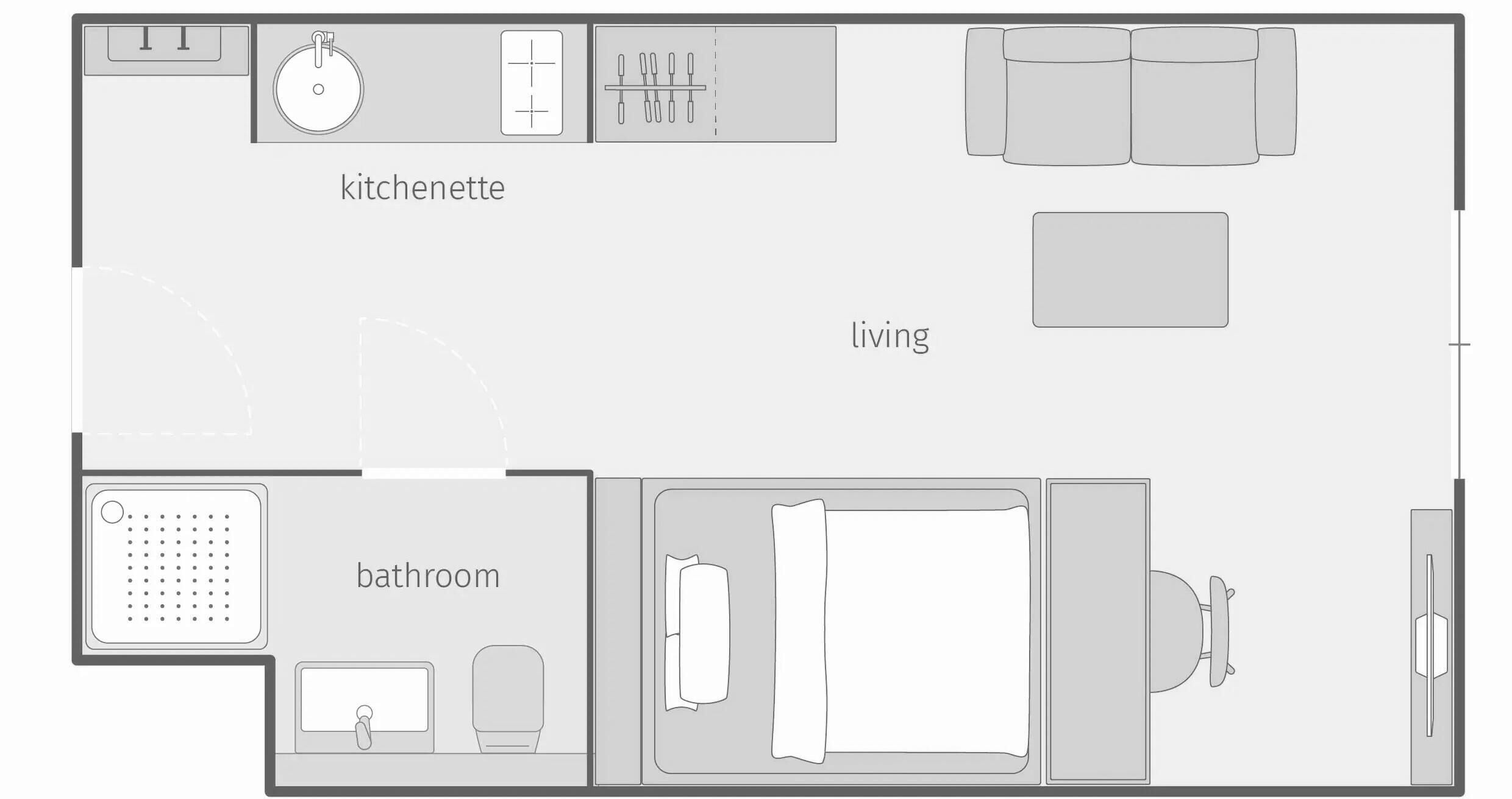 A floor plan of a hotel with a kitchenette, living area, and bathroom.