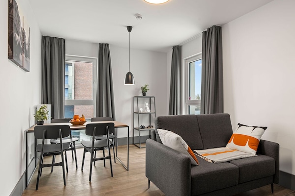 Apartment | Living area | 40-inch flat-screen TV with satellite channels