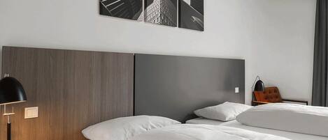 Studio Twin | Hypo-allergenic bedding, desk, laptop workspace, blackout curtains