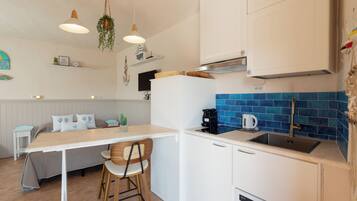 Apartment | Private kitchen | Fridge, stovetop, dishwasher, espresso maker