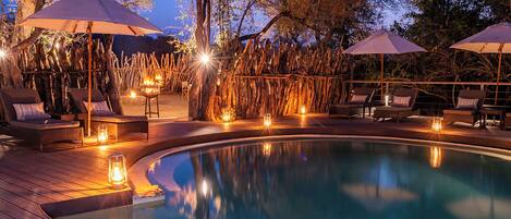 4 outdoor pools, open 7:00 AM to 5:00 PM, pool umbrellas, sun loungers