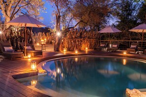 4 outdoor pools, open 7:00 AM to 5:00 PM, pool umbrellas, sun loungers